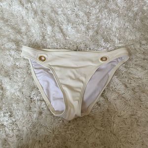 White Victoria’s Secret bikini bottom with gold